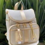 Mochila 2 em 1 com alça fixa - Linho Bege Cru com Dourado